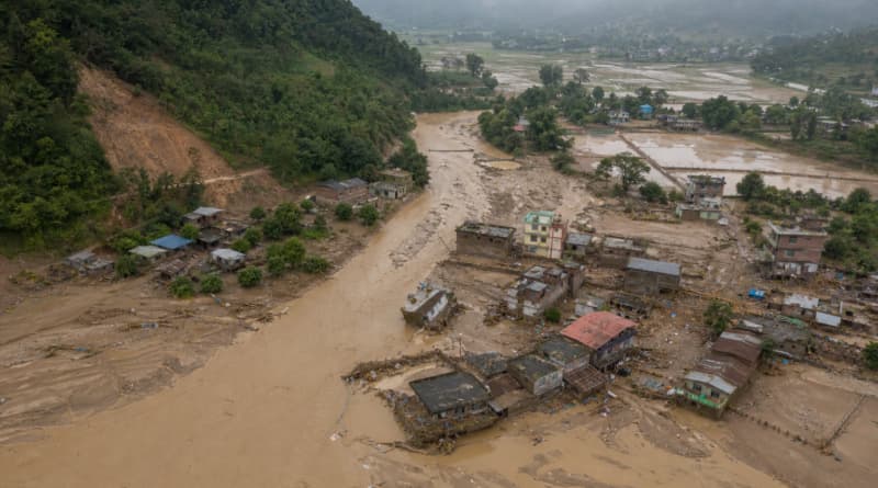 Death Toll Climbs as Rescuers in Nepal and China Scour Flood Zones for Hundreds Missing