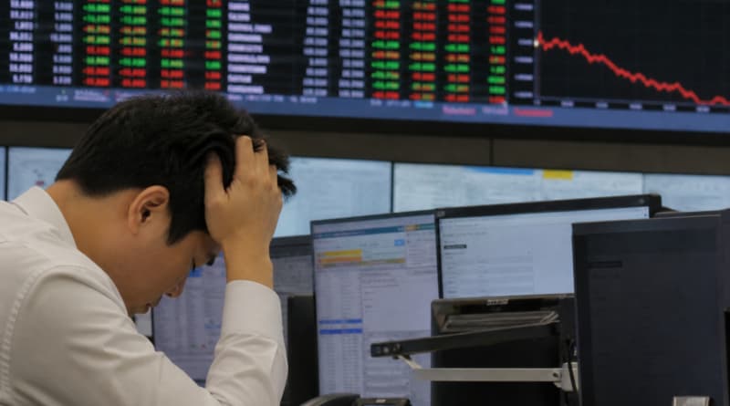World shares mostly decline as heavy selling hits AI-related stocks