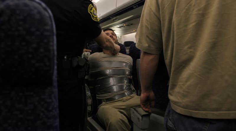 American Airlines Crew Praised After Disruptive Passenger Duct-Taped to Seat During Emergency Landing
