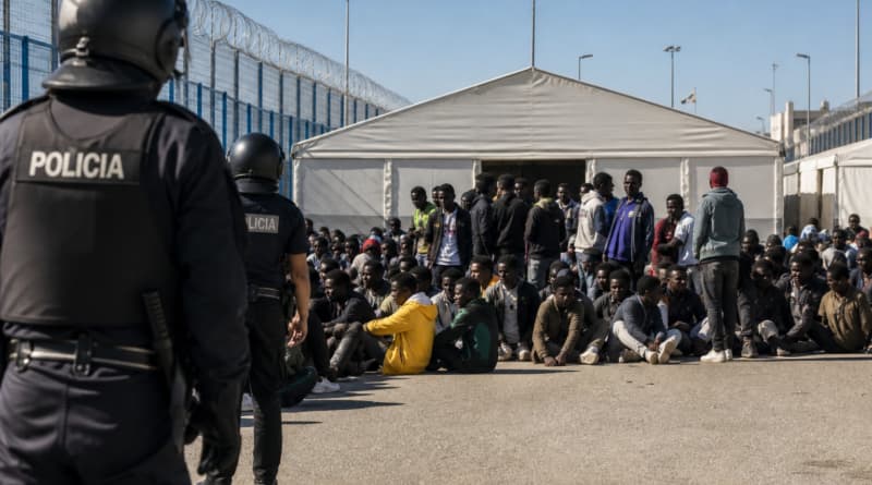 Spanish Police Relocate Hundreds of Migrants to New Camp in Ceuta